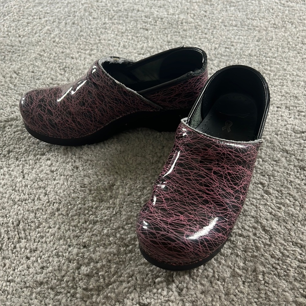 Pink and black used Danskos.